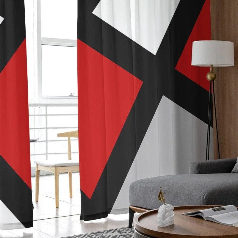 Rideaux design moderne avec motifs géométriques noirs, blancs et rouges. Idéals pour ajouter une touche contemporaine à votre salon. Ces rideaux habillent parfaitement les fenêtres tout en apportant une ambiance chic et sophistiquée à votre intérieur. Accessoire de décoration parfait pour les amateurs de style minimaliste et épuré.