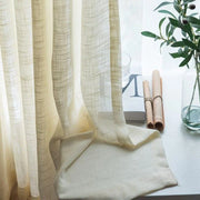 rideau imitation lin beige translucide scandinave tringle noire pompons decoration minimaliste