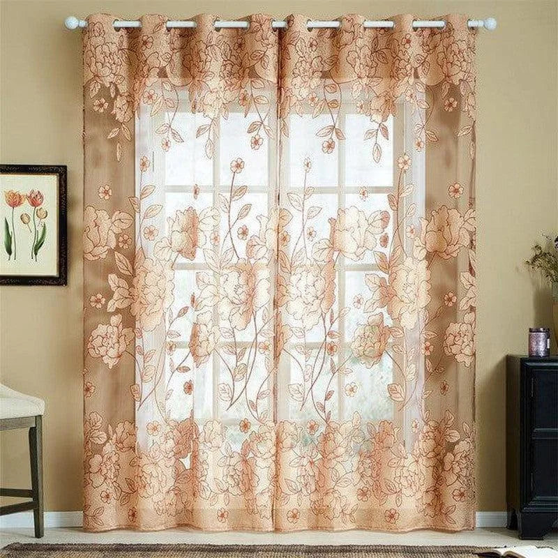 Rideaux élégants à motif floral offrant une décoration raffinée pour la maison. Ces voilages à œillets ajoutent une touche chaleureuse et accueillante à toute pièce. Parfaits pour un salon ou une chambre, ces rideaux ajourés permettent de filtrer délicatement la lumière tout en préservant l'intimité. Idéal pour créer une atmosphère sereine et charmante.