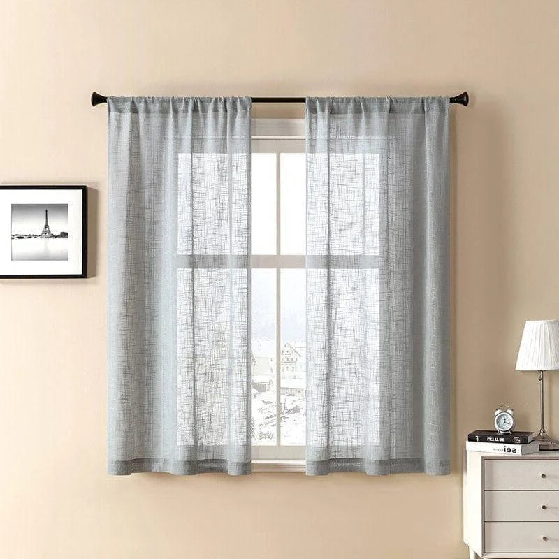 Rideau translucide gris pour salon ou chambre. Design moderne et élégant, idéal pour ajouter une touche de légèreté à votre intérieur. Laisse entrer la lumière naturelle tout en préservant l'intimité. Parfait pour une décoration contemporaine et minimaliste. Accessoire décoratif indispensable pour habiller vos fenêtres avec style.