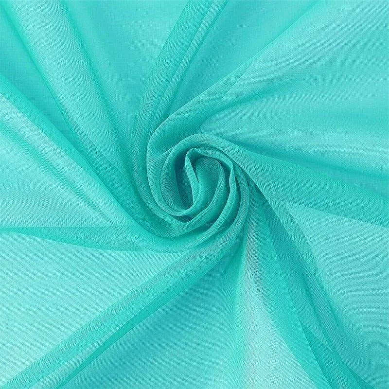 Voile turquoise lumineux, tissu fluide et léger idéal pour la décoration ou la confection de vêtements élégants, offrant une touche moderne et colorée à vos créations.