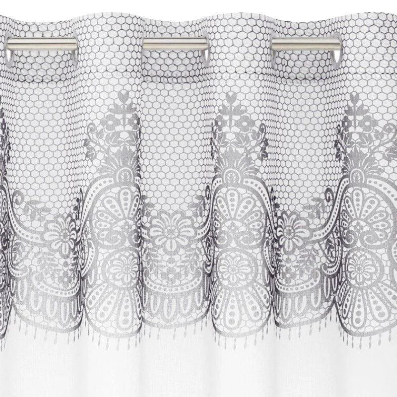 Rideau à motifs floraux, jouant sur une transparence élégante et moderne. Habillage parfait pour fenêtre avec anneaux pratiques, ajoutant une touche de raffinement et de charme à votre intérieur. Style sophistiqué idéal pour salle de séjour ou chambre.