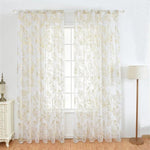 Rideaux transparents ornés de motifs floraux dorés, ajoutant une touche élégante et lumineuse à tout intérieur, idéals pour embellir les fenêtres de votre salon ou chambre à coucher. Styling raffiné et contemporain pour une décoration intérieure raffinée.