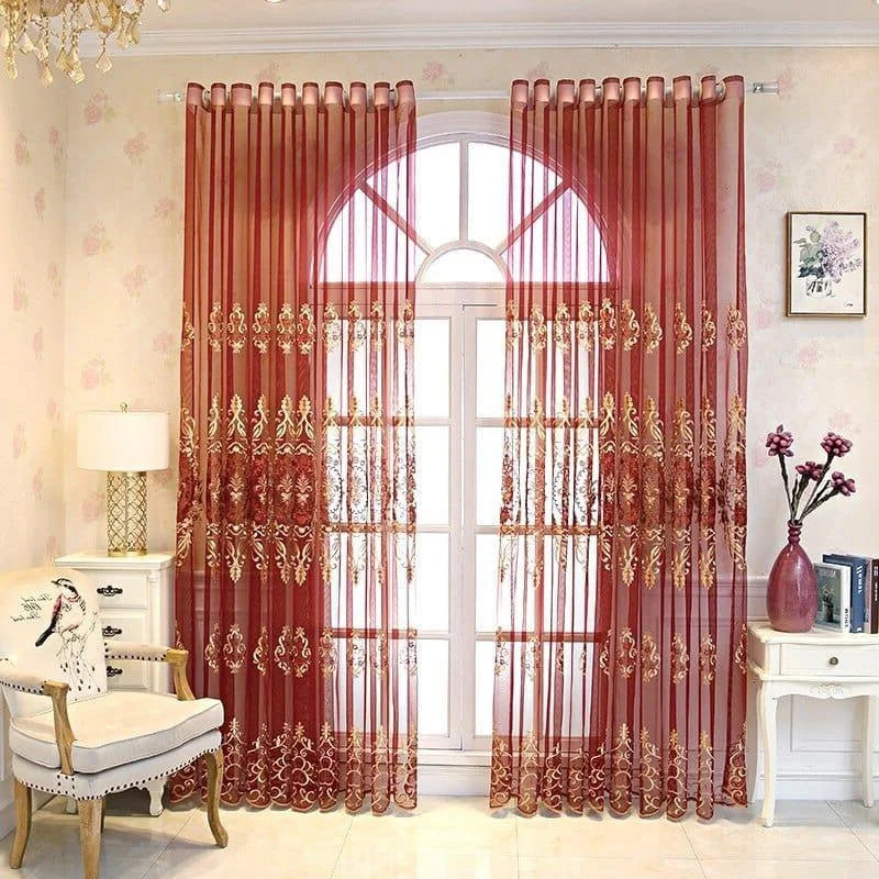 Rideaux élégants rouges avec motifs dorés, parfaits pour ajoutez une touche de sophistication à votre salon. Transformation lumineuse et chic de votre espace intérieur grâce à ce rideau raffiné. Idéal pour les fenêtres en arche, ce design floral et géométrique s'intègre harmonieusement à votre décoration. Profitez de l'intimité tout en laissant passer la lumière naturelle.