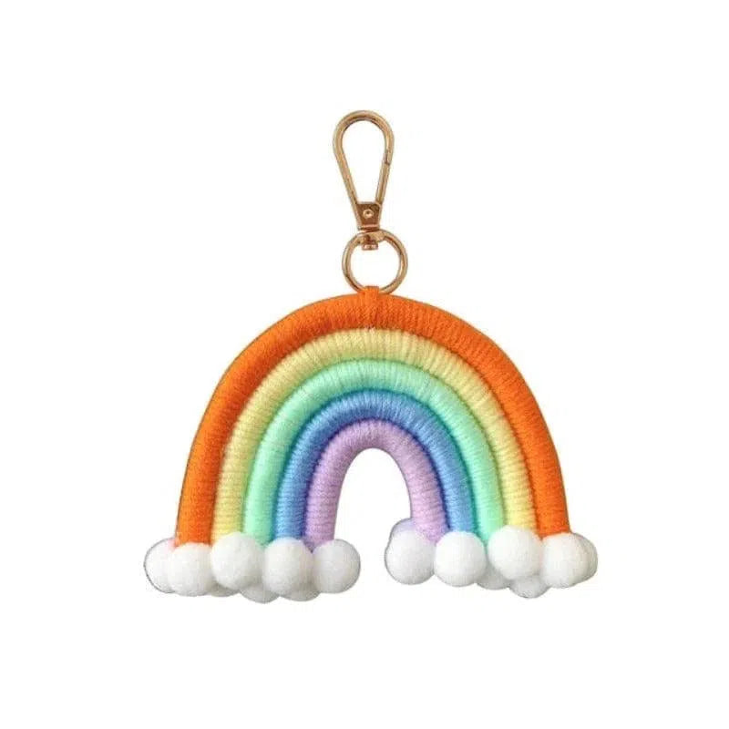 Porte-clés arc-en-ciel multicolore avec pompons, idéal pour ajouter une touche de couleur et de gaieté à votre sac ou trousseau de clés. Accessoire tendance parfait pour exprimer votre style unique.