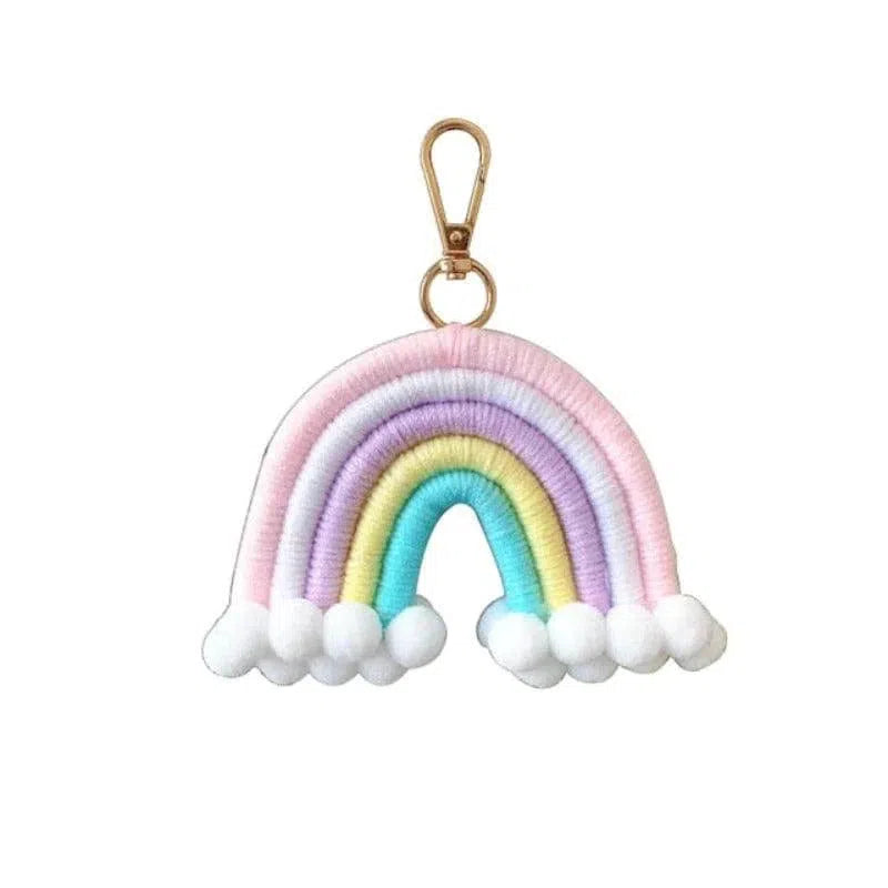 Porte-clés en forme d'arc-en-ciel aux couleurs pastel, accessoire tendance et mignon, idéal pour personnaliser sacs et trousseaux de clés. Ce joli pendentif, avec ses nuances douces, apporte une touche de gaieté au quotidien et constitue un cadeau original pour petits et grands. Parfait pour ajouter une note colorée et unique à vos accessoires personnels.