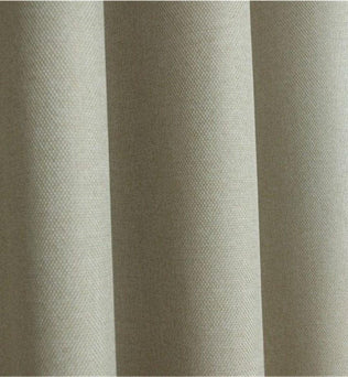 Rideau beige élégant pour salon moderne, offrant une ambiance chaleureuse et épurée avec une texture subtile. Idéal pour apporter une touche de sophistication à votre décoration intérieure tout en préservant votre intimité.