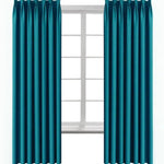 Paire de rideaux élégants de couleur bleu turquoise, idéale pour l'aménagement intérieur et la décoration de fenêtres. Cette tenture ajoute une touche moderne et sophistiquée à n'importe quelle pièce de la maison. Parfaite pour contrôler la lumière et offrir une ambiance chaleureuse à votre salon ou chambre.