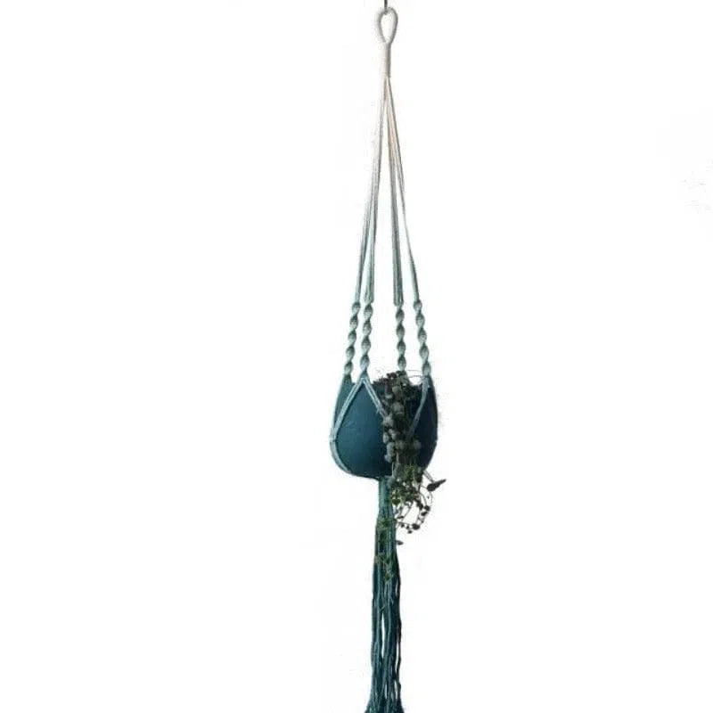Porte-plante suspendu bleu élégant, idéal pour l'intérieur et l'extérieur, mettant en valeur vos plantes avec style. Accessoire déco tendance pour embellir votre espace de vie. Parfait pour les amateurs de jardinage et de décoration intérieure.
