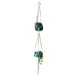 Suspension botanique design, porte-plantes d'intérieur, idéal pour décorer votre maison avec élégance. Présente deux cache-pots, parfait pour optimiser l'espace tout en ajoutant une touche de verdure et de modernité. Convient pour le salon, la chambre ou le bureau. Accessoire de décoration suspendu pratique et esthétique pour sublimer votre intérieur.