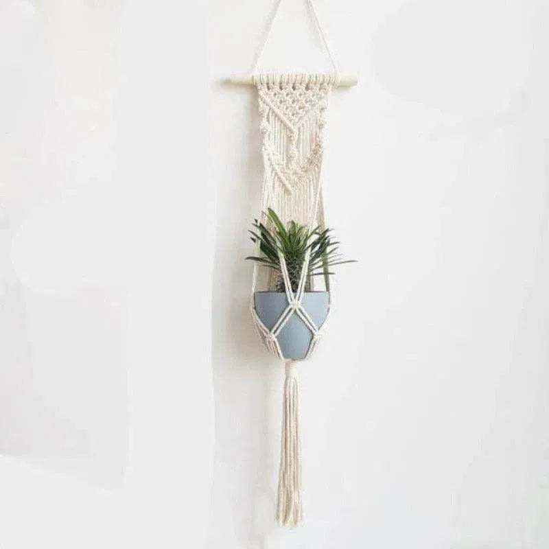 Suspension murale en macramé avec pot de fleurs, décoration boho pour intérieur, accroche-plante tendance pour salon ou chambre à coucher. Idéal pour ajouter une touche naturelle et design à votre espace de vie. Solution élégante pour l'aménagement des plantes d'intérieur.