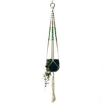 Suspension de plante design avec perles vertes, ajout élégant pour la décoration intérieure. Porte-pot idéal pour les suspensions murales et l'optimisation de l'espace. Accessoire déco tendance pour sublimer vos plantes d'intérieur.