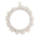 Miroir rond avec bordure décorative, idéal pour ajouter une touche bohème chic à votre intérieur. Parfait pour le salon, la chambre ou l'entrée, ce miroir mural s'intègre harmonieusement dans tous les styles de décoration. Élégance et originalité au rendez-vous pour sublimer votre espace de vie.