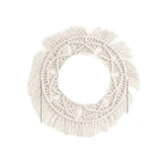 Couronne décorative bohème chic avec franges, idéale pour embellir un intérieur cosy. Parfait accessoire mural pour un style naturel et épuré.