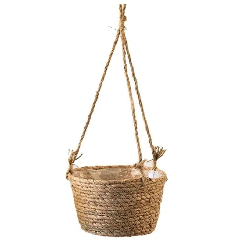 Suspension décorative tressée pour plantes, idéale pour embellir votre intérieur avec une touche naturelle. Panier suspendu élégant conçu pour accueillir vos plantes préférées, apportant charme et style bohème à votre espace de vie. Parfait pour les salons, balcons ou terrasses.