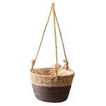 Panier suspendu décoratif avec design bicolore, parfait pour ajouter une touche naturelle à votre intérieur. Idéal pour les plantes, ce panier suspendu apportera une ambiance chaleureuse et authentique à votre décoration. Design élégant et pratique pour un style moderne et épuré.