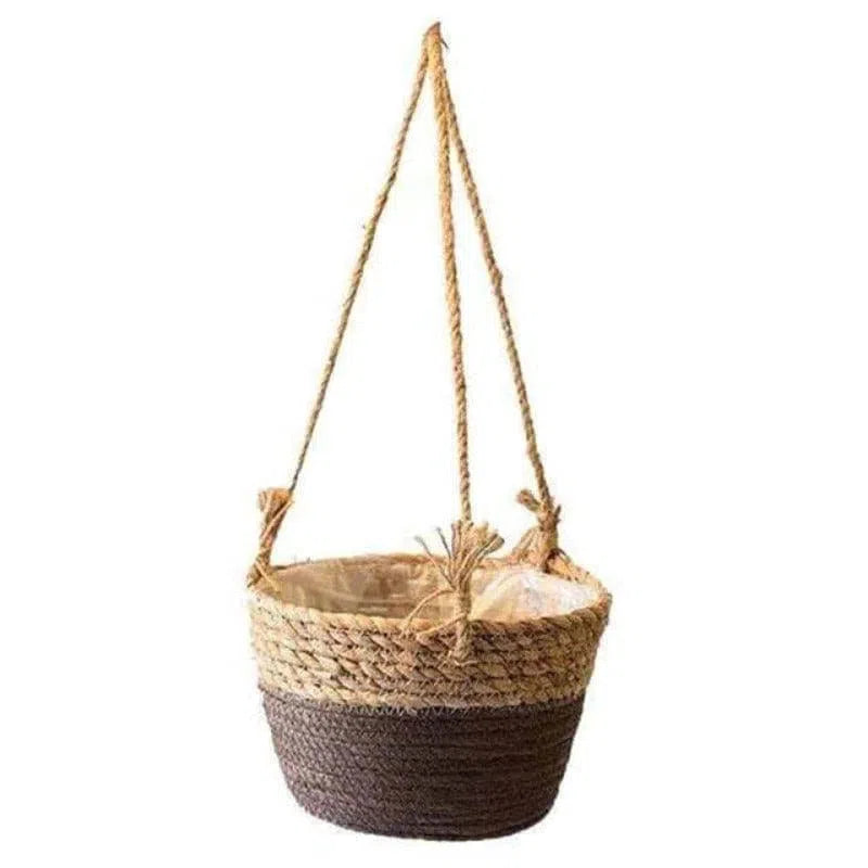 Panier suspendu décoratif avec design bicolore, parfait pour ajouter une touche naturelle à votre intérieur. Idéal pour les plantes, ce panier suspendu apportera une ambiance chaleureuse et authentique à votre décoration. Design élégant et pratique pour un style moderne et épuré.