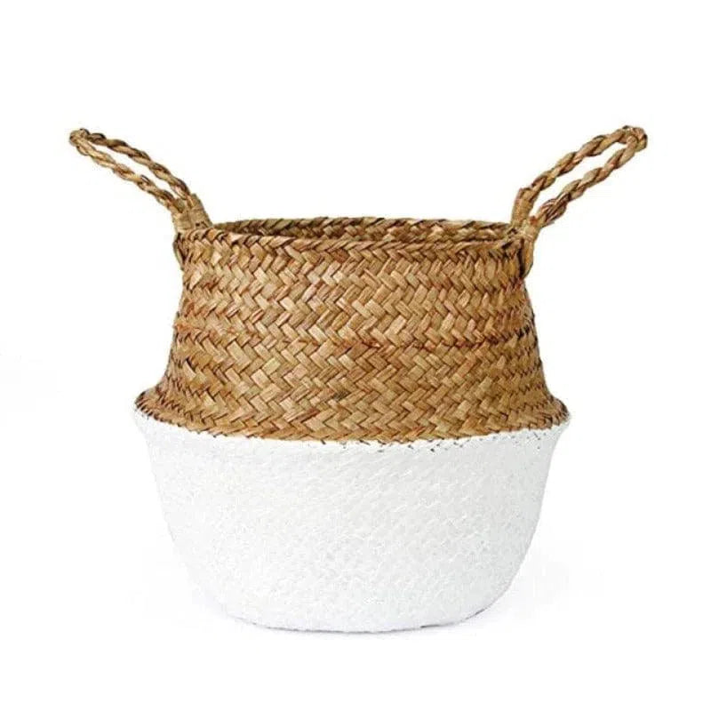 Panier de rangement décoratif avec poignées en tressage bicolore, pratique pour organiser l'espace intérieur. Idéal pour le salon, la chambre ou la salle de bain, ajoutant une touche naturelle et élégante à la décoration.
