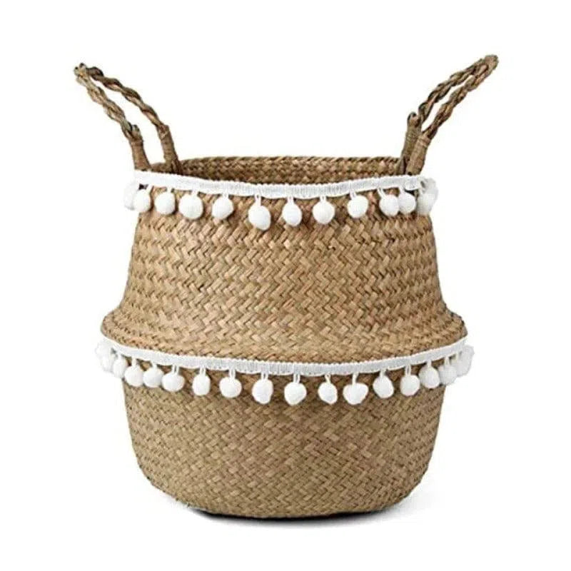 Panier de rangement multifonctionnel avec pompons décoratifs blancs, idéal pour ajouter une touche bohème à votre intérieur. Solution parfaite pour organiser vos espaces avec style.