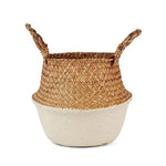 Panier décoratif rond avec poignées, style tendance bicolore, idéal pour le rangement et l'organisation à la maison. Parfait pour le salon, la chambre ou tout espace nécessitant une touche naturelle et moderne. Adapté pour les plantes, les magazines ou les jouets.