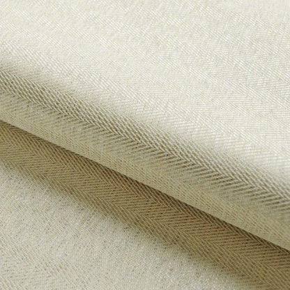 Tissu beige avec motif à chevrons, idéal pour la décoration intérieure ou la confection de vêtements. Style élégant et sobre, convient pour un usage polyvalent.