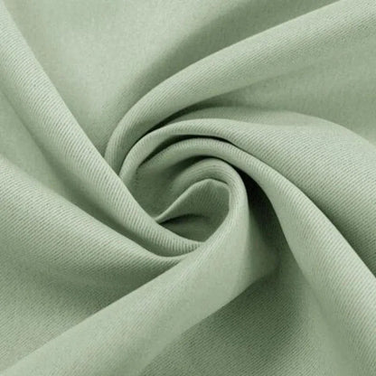 Rideau élégant de couleur vert clair pour salon moderne, parfait pour créer une ambiance apaisante. Design contemporain, idéal pour décoration intérieure raffinée. Offrant une esthétique épurée, ce rideau s’intègre facilement dans tout espace de vie.