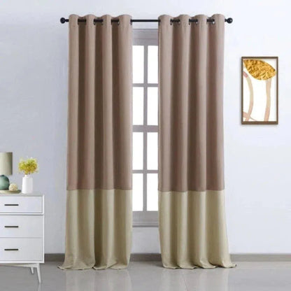 Rideau bicolore élégant avec anneaux, parfait pour un salon moderne. Design contemporain avec contraste de couleurs neutres. S'harmonise avec différents styles de décoration intérieure, idéal pour filtrer la lumière tout en apportant une touche sophistiquée à votre espace. Accessoire de décoration pratique et esthétique pour fenêtres.
