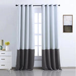 Rideau moderne bicolore noir et blanc pour salle de séjour, ameublement intérieur élégant, lumière naturelle filtrante, accessoire déco tendance pour salon, installation facile avec œillets, style contemporain et épuré.