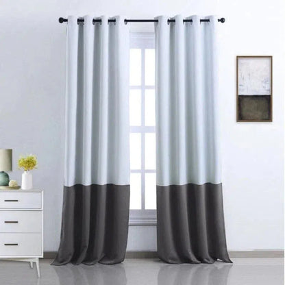 Rideau moderne bicolore noir et blanc pour salle de séjour, ameublement intérieur élégant, lumière naturelle filtrante, accessoire déco tendance pour salon, installation facile avec œillets, style contemporain et épuré.