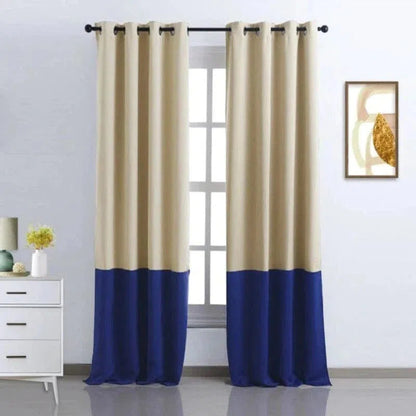 Rideau élégant avec design bicolore beige et bleu marine, idéal pour une décoration moderne et stylée de salon ou chambre. Accroché sur une tringle noire, ce rideau offre une touche contemporaine et sophistiquée à votre intérieur, parfait pour contrôler la luminosité tout en apportant une ambiance chaleureuse et accueillante.