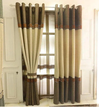 Rideaux élégants avec motifs géométriques, parfaits pour apporter une touche de sophistication à votre salon. Design bicolore avec contraste subtil, ces rideaux moderniseront votre intérieur tout en offrant une lumière tamisée. Idéal pour créer une ambiance chaleureuse et accueillante.