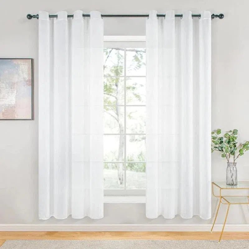 Rideau blanc élégant pour salon, décoration de fenêtre moderne, lumière naturelle filtrante, idéal pour chambres et bureaux, style intemporel et épuré, améliore l'esthétique intérieure, installation facile avec tringle, parfait pour créer une atmosphère apaisante et lumineuse.