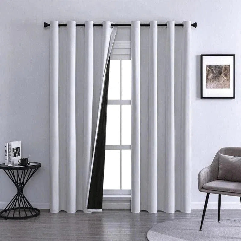 Rideau occultant moderne gris pour salon, monté sur barre avec anneaux, idéal pour ajouter une touche élégante à votre décoration intérieure tout en contrôlant la lumière naturelle.