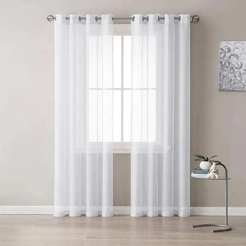 Rideau blanc transparent pour salon moderne, design élégant avec œillets en métal, parfait pour habiller les fenêtres et créer une ambiance lumineuse et aérée. Ajustement facile sur tringle standard, idéal pour décorer votre espace de vie avec style. Convient pour chambre à coucher, salon ou bureau.