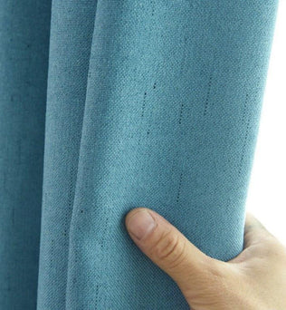 Rideau bleu élégant pour décoration intérieure, transformant l'ambiance de votre pièce avec style et simplicité. Idéal pour salon, chambre ou bureau, apportant une touche de couleur apaisante.