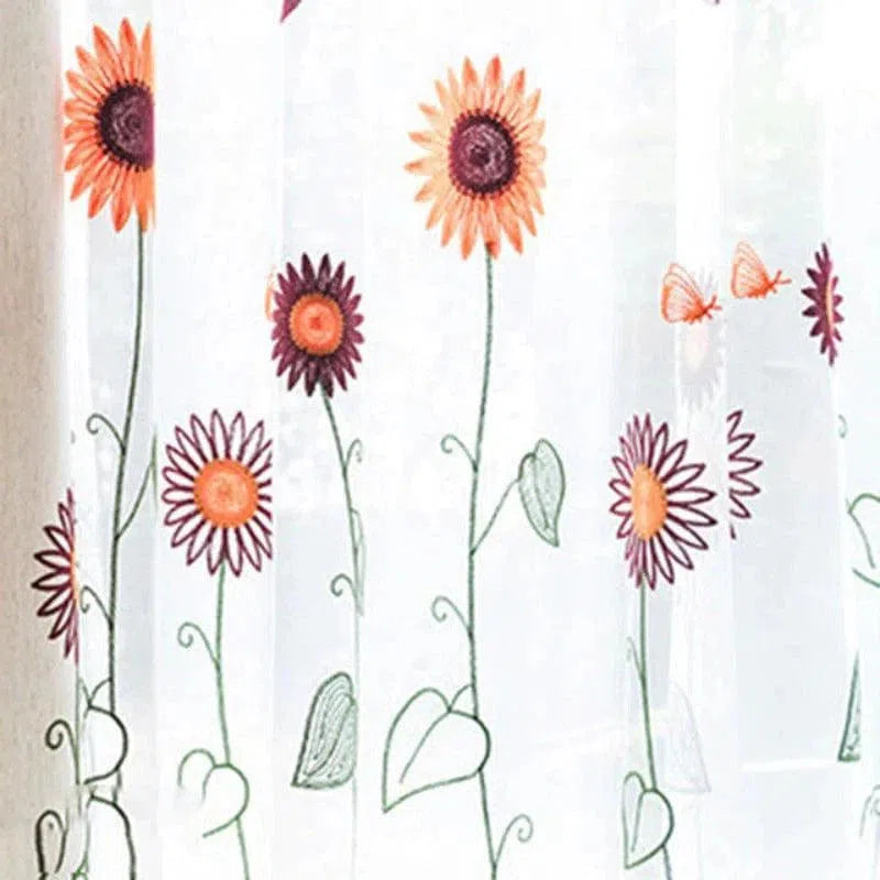 Voilage décoratif avec motif floral coloré, featuring des fleurs aux teintes orange et pourpre, idéal pour apporter une touche de fraîcheur et de couleur à votre intérieur tout en laissant entrer la lumière naturelle. Design élégant et contemporain, parfait pour une ambiance chaleureuse dans le salon ou la chambre à coucher.