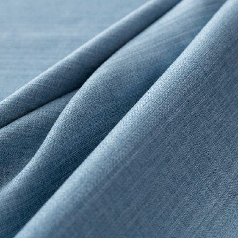 Rideau bleu élégant pour décoration intérieure, ajoutant une touche moderne et apaisante à votre salon ou chambre à coucher.
