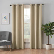 rideau thermique polaire beige lisse moderne épures métalliques tringle fenêtre chaise plante verte tableau