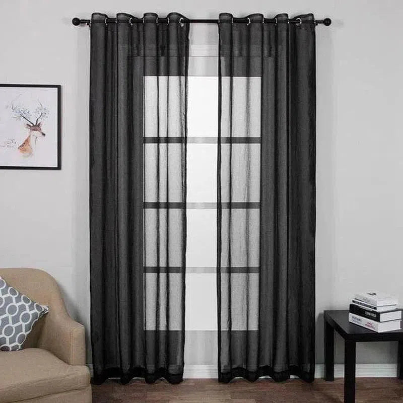 Rideaux modernes noirs pour salon, apportant une touche élégante et sophistiquée à votre intérieur. Design contemporain ajustable, idéal pour filtrer la lumière et préserver l'intimité de votre espace. Parfait pour les salons et chambres à coucher. Accessoire déco tendance facile à installer.