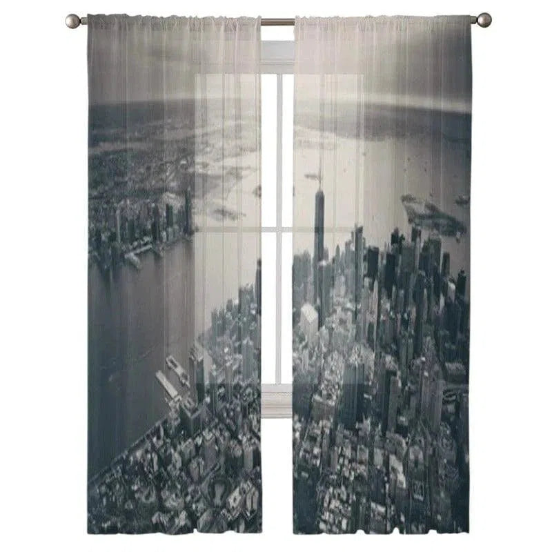 Rideaux avec vue aérienne sur une métropole urbaine, parfaits pour ajouter une touche moderne et sophistiquée à votre décoration intérieure. Ces rideaux apportent une ambiance urbaine et contemporaine à n'importe quelle pièce, créant une vue panoramique impressionnante sur la ville. Idéals pour les amateurs de design original et d'élégance citadine.