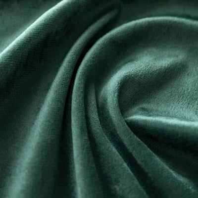 Rideau élégant vert foncé ondulé, idéal pour ajouter une touche de sophistication et de confort à votre intérieur. Ce rideau moderne et stylé s'adapte parfaitement aux salons, chambres ou bureaux, apportant une ambiance chaleureuse et accueillante.