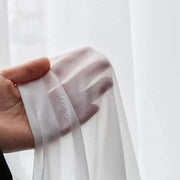 rideaux blancs texturés translucides élégants détails dorés passe tringle plis flamands galon fronceur intimité