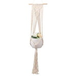 Suspension murale pour plantes, idéale pour ajouter une touche bohème à votre décoration intérieure. Porte-plante élégant permettant de mettre en valeur vos fleurs préférées. Accessoire parfait pour sublimer votre espace de vie.