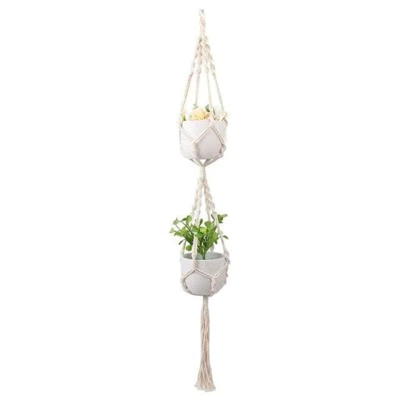 Suspension pour plantes à deux niveaux, parfaite pour décorer votre intérieur et maximiser l'espace. Idéale pour ajouter une touche de verdure à votre maison. Convient pour des pots de petite taille. Design élégant et moderne pour sublimer votre décoration. Facile à installer et à entretenir.