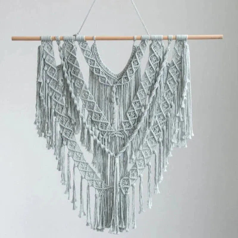 Décoration murale bohème chic en macramé, accent unique pour un intérieur moderne, parfait pour ajouter une touche artistique et élégante à votre salon ou chambre. Suspension murale artisanale avec motifs géométriques détaillés, idéale pour créer une ambiance chaleureuse et accueillante.