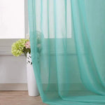 Voilage turquoise élégant pour décoration intérieure, apportant une touche de fraîcheur et de légèreté à votre salon ou chambre. Parfait pour ajouter de la couleur et transformer l'ambiance de vos pièces. Idéal pour compléter une décoration moderne et lumineuse. Disponible en différentes tailles pour s'adapter à vos fenêtres.