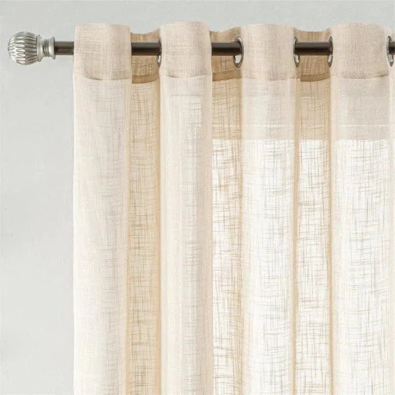Rideaux transparents blancs avec œillets sur tringle, parfaits pour un salon moderne et lumineux. Ajoutez une touche élégante à votre décoration intérieure avec ces voilages qui diffusent la lumière naturelle. Idéal pour créer une ambiance apaisante et raffinée.