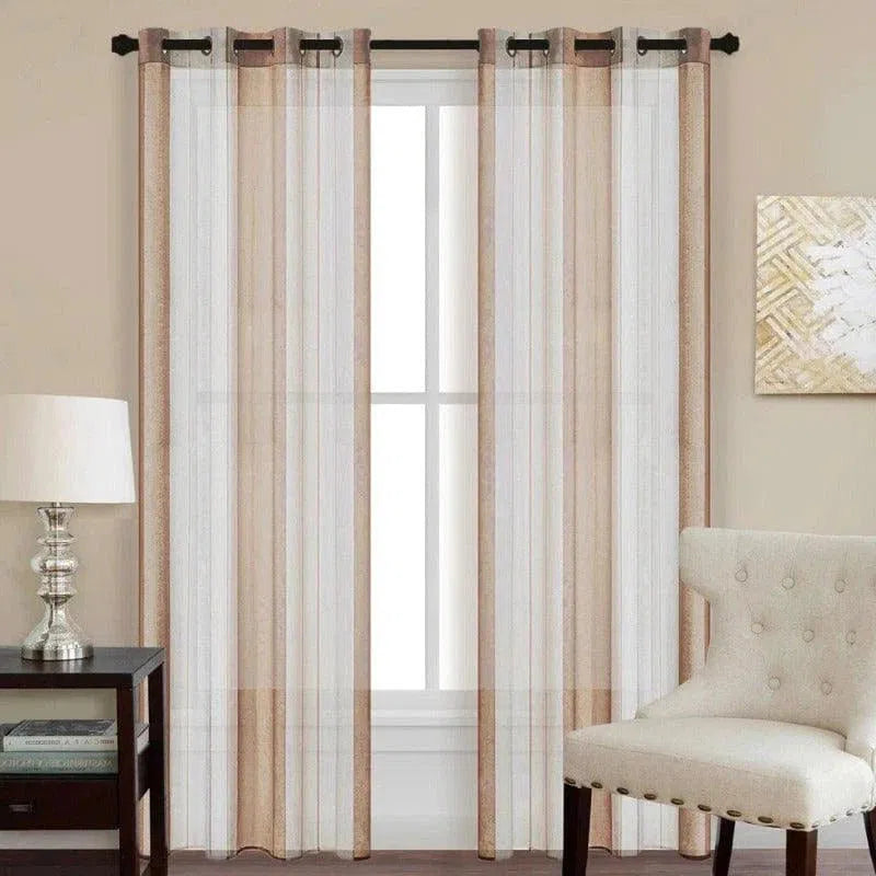 Rideaux élégants pour salon avec œillets, apportant une touche moderne et sophistiquée à votre décoration intérieure. Ces voilages transparents permettent de filtrer la lumière tout en préservant votre intimité. Idéals pour ajouter du style à votre espace de vie tout en embellissant vos fenêtres. Parfaits pour un intérieur chic et minimaliste.
