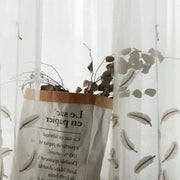 voilage blanc feuilles brodées texture frangée transparent bohème minimaliste chambre salon