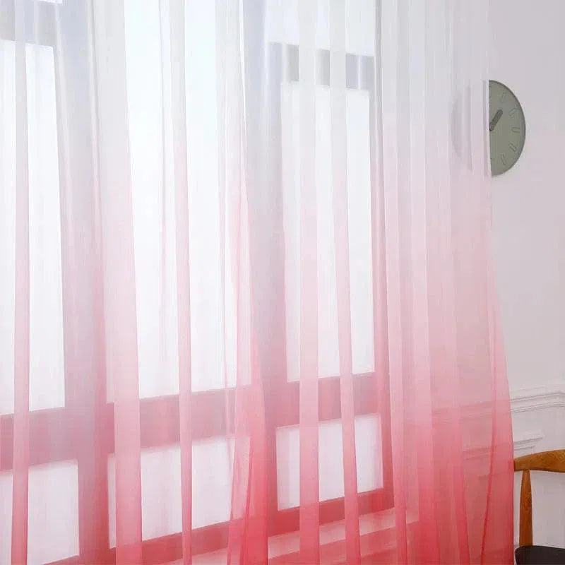 Rideau translucide dégradé rose, idéal pour ajouter une touche de couleur douce à votre intérieur. Ce voilage léger transforme l'atmosphère de votre pièce en permettant à la lumière naturelle de filtrer doucement, créant une ambiance chaleureuse et accueillante. Parfait pour salon, salle à manger ou chambre.